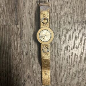 Gucci Gold Leather Bracelet Watch with Embossed GG Strap